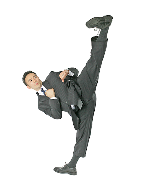 Master Mike Lee performing a side kick